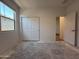 Bedroom featuring a window and closet space, offering a comfortable and functional layout at 4521 S 95Th Dr, Tolleson, AZ 85353