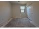 Bedroom with a window and closet space, offering a comfortable and functional layout at 4521 S 95Th Dr, Tolleson, AZ 85353
