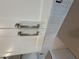 Close up of the modern white cabinetry at 4521 S 95Th Dr, Tolleson, AZ 85353