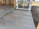 A new patio slab is poured in the backyard of a home under construction at 4521 S 95Th Dr, Tolleson, AZ 85353