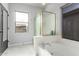 Bright bathroom with a separate glass shower and luxurious soaking tub at 461 W Flamingo Dr, Chandler, AZ 85286