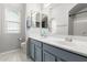 Bathroom featuring double sinks, ample counter space, and updated fixtures at 461 W Flamingo Dr, Chandler, AZ 85286