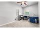 Cozy bedroom with neutral tones and a designated study and play area at 461 W Flamingo Dr, Chandler, AZ 85286
