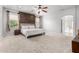 Bright primary bedroom features a decorative wood panel, and ensuite access at 461 W Flamingo Dr, Chandler, AZ 85286