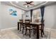 Cozy dining room features a modern table set and a large window with natural light at 461 W Flamingo Dr, Chandler, AZ 85286