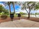 Two barbecue grills by the lakeside provide a convenient and scenic spot for outdoor cooking and picnics at 461 W Flamingo Dr, Chandler, AZ 85286