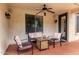 Cozy covered patio with outdoor seating and a fire pit at 461 W Flamingo Dr, Chandler, AZ 85286
