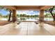Sheltered picnic tables offer a serene view of the lake, providing a perfect spot for outdoor dining at 461 W Flamingo Dr, Chandler, AZ 85286