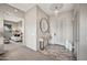 Inviting foyer with tiled flooring, a console table, and views into the living room at 4960 E Villa Theresa Dr, Scottsdale, AZ 85254