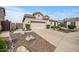 Well-maintained single-story home with desert landscaping and charming curb appeal at 4960 E Villa Theresa Dr, Scottsdale, AZ 85254