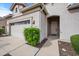 Inviting single-story home featuring a well-manicured lawn and charming curb appeal at 4960 E Villa Theresa Dr, Scottsdale, AZ 85254