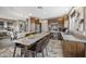 Spacious kitchen with a large center island, custom cabinets, and modern appliances at 4960 E Villa Theresa Dr, Scottsdale, AZ 85254
