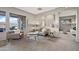 Spacious living room with stylish leather furniture and bright natural light at 4960 E Villa Theresa Dr, Scottsdale, AZ 85254