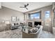 Inviting living room with a fireplace, comfortable seating, and stylish decor at 4960 E Villa Theresa Dr, Scottsdale, AZ 85254