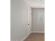 Bedroom featuring wood floors, neutral colored walls, and a window with blinds for natural light at 510 W 14Th St, Tempe, AZ 85281