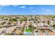 Picturesque aerial view of homes with well-kept yards, backyard amenities, and a vibrant, Gathering-friendly atmosphere at 528 E Kyle Ct, Gilbert, AZ 85296
