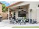 Cozy covered patio with comfortable seating, a ceiling fan, and a gas heater, ideal for relaxing outdoors at 528 E Kyle Ct, Gilbert, AZ 85296