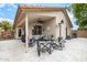 Covered patio featuring a ceiling fan, stylish seating, and a BBQ, perfect for outdoor entertaining at 528 E Kyle Ct, Gilbert, AZ 85296