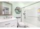 A bright bathroom with a sleek vanity, decorative mirror, and an elegant walk-in shower at 528 E Kyle Ct, Gilbert, AZ 85296
