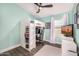 Inviting ' bedroom with loft bed, desk, ceiling fan, and lots of room for activities and personalization at 528 E Kyle Ct, Gilbert, AZ 85296