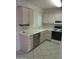 Cozy kitchen features modern appliances, wood cabinets, and tile flooring at 6230 S Championship Dr, Chandler, AZ 85249