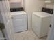 Functional laundry room with a matching washer and dryer set at 6230 S Championship Dr, Chandler, AZ 85249
