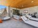 Inviting outdoor balcony with modern seating, fireplace, television and outdoor exercise equipment at 6311 E Phoenician Blvd # 19, Scottsdale, AZ 85251