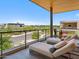 Relaxing balcony featuring lounge chairs and scenic views of the neighborhood and golf course at 6311 E Phoenician Blvd # 19, Scottsdale, AZ 85251