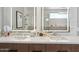 Elegant bathroom featuring double sinks, sleek fixtures, and stylish, light-up mirrors offering a luxurious experience at 6311 E Phoenician Blvd # 19, Scottsdale, AZ 85251
