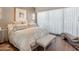 This home's primary bedroom is a serene space with a large bed, soft lighting and stylish decor at 6311 E Phoenician Blvd # 19, Scottsdale, AZ 85251