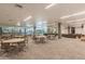 Spacious community room with rows of seating and views of the pool and exercise area at 7167 E Rancho Vista Dr # 4011, Scottsdale, AZ 85251