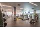 Bright fitness center with weights, treadmills, ellipticals, and large screen televisions at 7167 E Rancho Vista Dr # 4011, Scottsdale, AZ 85251