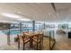Indoor pool with tables and chairs around the perimeter at 7167 E Rancho Vista Dr # 4011, Scottsdale, AZ 85251