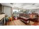 Living room features hardwood floors, large sliding doors to the balcony, and comfortable seating at 7167 E Rancho Vista Dr # 4011, Scottsdale, AZ 85251