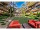 Outdoor putting green surrounded by lush landscaping and comfortable seating, perfect for leisure at 7167 E Rancho Vista Dr # 4011, Scottsdale, AZ 85251