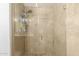 Modern tiled shower with glass door and shower head offers a clean and stylish bathing space at 7167 E Rancho Vista Dr # 4011, Scottsdale, AZ 85251