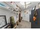 Functional storage room with shelving, lighting, and ample space for organizing belongings at 7611 E Pasadena Ave, Scottsdale, AZ 85250