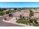 Residential aerial view showcasing a house with a three-car garage and well-kept landscaping at 7648 W Mauna Loa Ln, Peoria, AZ 85381