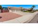 Wide view of home with RV parking and a three-car garage and well-kept landscaping at 7648 W Mauna Loa Ln, Peoria, AZ 85381