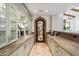 Elegant bar area with custom cabinetry and countertops at 8329 N Ridgeview Dr, Paradise Valley, AZ 85253
