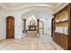 Elegant bathroom featuring a soaking tub, fireplace, and stone accents throughout at 8329 N Ridgeview Dr, Paradise Valley, AZ 85253