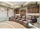 Home theater featuring plush seating, custom cabinetry, and a projector for movie nights at 8329 N Ridgeview Dr, Paradise Valley, AZ 85253