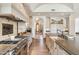Gourmet kitchen with professional-grade stainless steel appliances and custom cabinetry at 8329 N Ridgeview Dr, Paradise Valley, AZ 85253