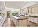 Bright kitchen with an oversized island, stainless appliances, and lots of counter space at 8329 N Ridgeview Dr, Paradise Valley, AZ 85253