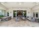 Inviting covered patio offering a dining area and comfortable seating, perfect for relaxing outdoors at 8329 N Ridgeview Dr, Paradise Valley, AZ 85253