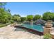 Stunning pool featuring a waterfall feature surrounded by lush landscaping, creating a backyard oasis at 8329 N Ridgeview Dr, Paradise Valley, AZ 85253