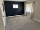 Bright bedroom features plush carpet and neutral paint, offering a serene retreat at 836 W Mitchell Dr, Phoenix, AZ 85013