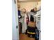 Walk-in closet with plenty of storage space to accommodate many articles of clothing at 9252 W Carol Ave, Peoria, AZ 85345