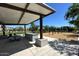 View of shaded picnic tables and playground area promoting outdoor gathering at 1081 E Armstrong Way, Chandler, AZ 85286