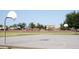 A community basketball court with playground equipment and a picnic area for residents to enjoy at 10909 W Chase Ln, Avondale, AZ 85323